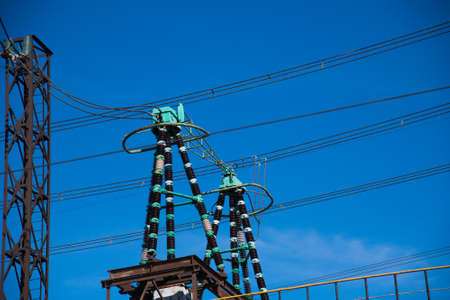 High-voltage power transformer substation. Power plant against a blue skyの写真素材