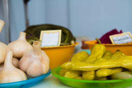 Pickled cucumbers, tomatoes and other vegetables are for saleの写真素材