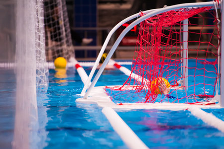 Water polo action in a swimming pool