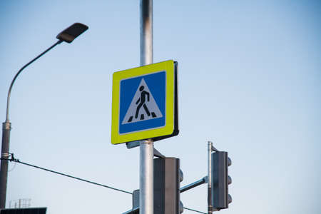 Traffic light at the pedestrian crossing. Traffic light with green light and road sign Pedestrian crossingの写真素材