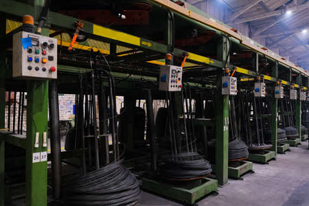 Machines, equipment and coils with wire. Wire production plantの写真素材