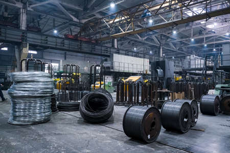Machines, equipment and coils with wire. Wire production plantの写真素材