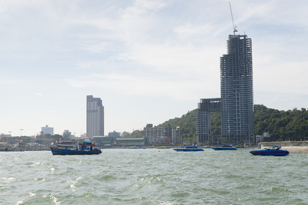 Ship and Pattaya city in a summer day.の写真素材