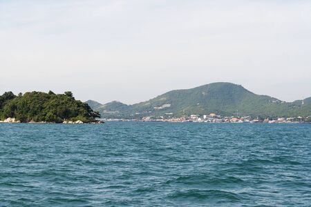 Sea, island and sky on a Sunny day.の写真素材