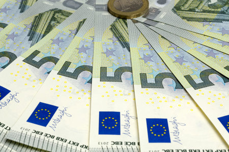 Banknotes and coin.