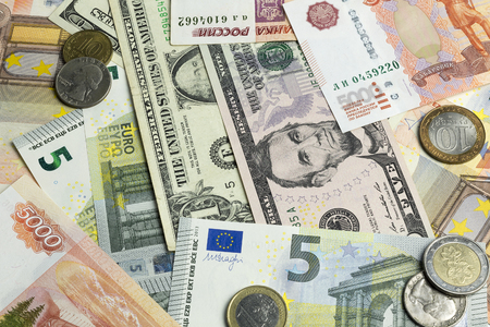 The money lay scattered on the table.の写真素材