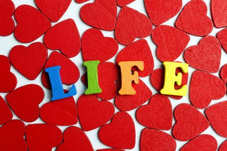 Many red hearts are on the table.の写真素材