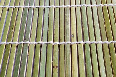 Wooden plank lying twisted on the floor.の写真素材