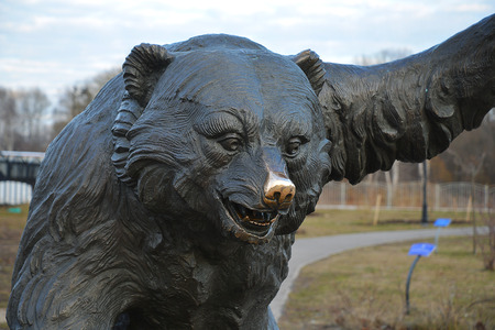 The bear stands as a monument in the center of the Park.の写真素材