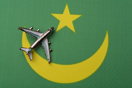 Plane over flag Mauritaniaの写真素材