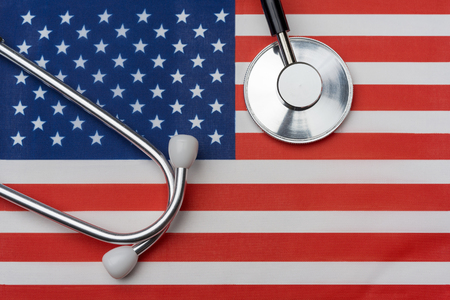 USA flag and stethoscope.の写真素材
