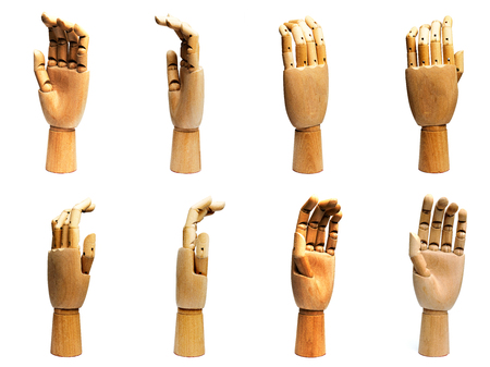 Wooden Hand isolated on a white background from different angles.の写真素材