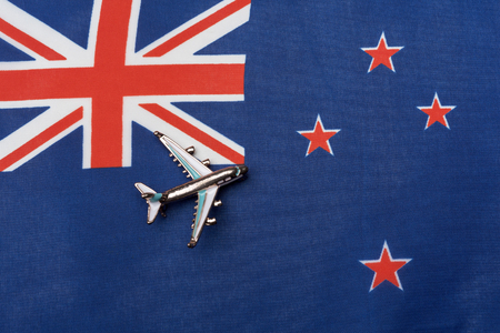 The plane over the flag of New Zealandの写真素材