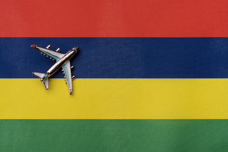 Plane over the flag of Mauritiusの写真素材