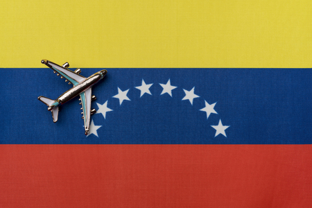 The plane over the flag of Venezuelaの写真素材