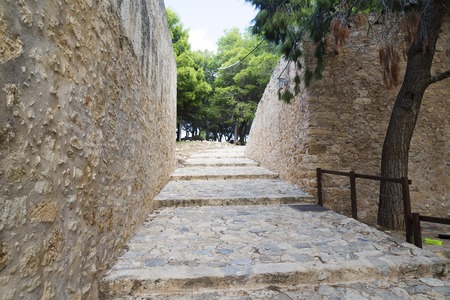 Old stone staircase in the fortress Fortezza, Crete, Greece.の写真素材