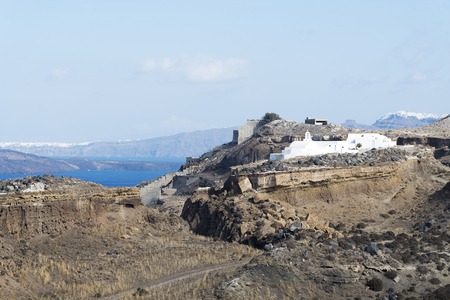 The mountains of Santorini on a cloudy day.の写真素材