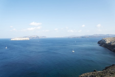 Stunning landscape with views of the island of Santorini, Greece in a summer day.の写真素材