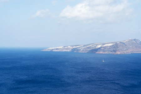Stunning landscape with views of the island of Santorini, Greece in a summer day.の写真素材