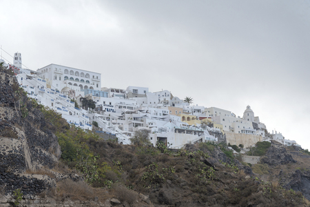 Famous view of Oia in Santorini, Greece on an overcast day.の写真素材