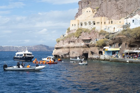 Passenger ship near the island of Santorini at the Sunny day.のeditorial素材
