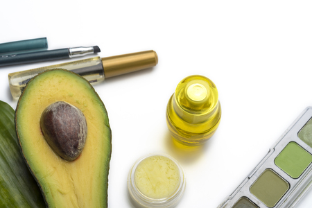 Natural herbal skin care products, top ingredients, avocado, isolated background makeup brushes for face and cosmetic products. Preparation facial skin care.の写真素材