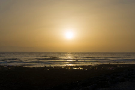 Sunset in Tenerife overlooking the ocean. The concept of relaxation and romance on the Spanish...