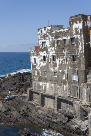 A very old house on the coast of the island of Tenerife. The concept of tourism and travel.のeditorial素材