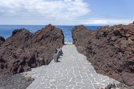 Stone path leading to the sea island of Tenerife. The concept of tourism and travel.の写真素材