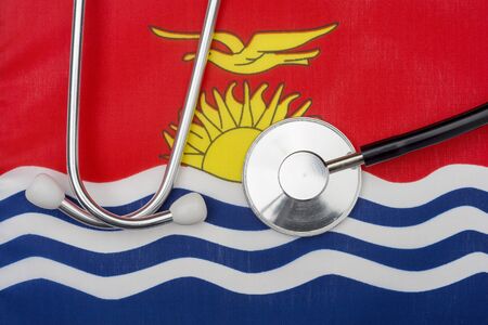 Concept of medicine with stethoscope on the flag of Kiribati in the background.の写真素材