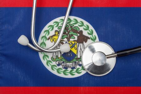 Concept of medicine with stethoscope on the flag of Belize in the background.の写真素材