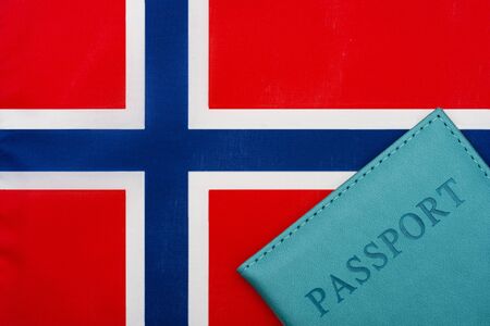 On the background of the flag of Norway is a passport.の写真素材