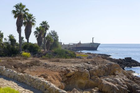 Abandoned ship that was shipwrecked off near the coast of Cyprus. An abandoned ship aground.の写真素材