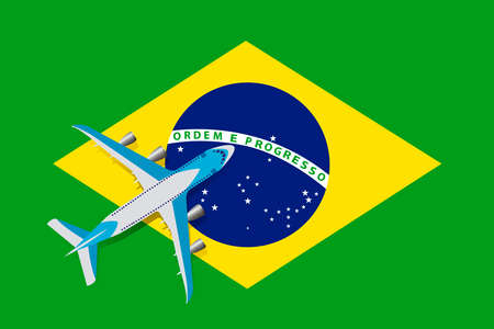 Vector Illustration of a passenger plane flying over the flag of Brazil. Concept of tourism and travelのイラスト素材