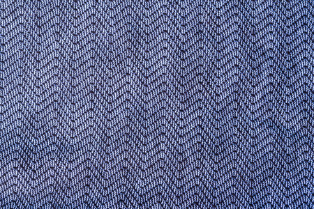 Qualitative blue fabric texture. Abstract background. Close up. Blue cotton fabric on the...