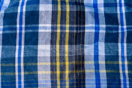 Blue checkered fabric with blue stripes. The concept of design and quality.の写真素材
