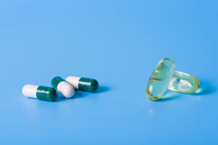 Omega 3 health capsules on a blue background. The concept of a healthy life.