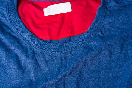 Dark blue plain cotton t-shirt. a stylish shirt with a round collar and red lining.の写真素材