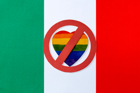 the flag of Italy and the ban on LGBT people. A crossed-out red circle of a heart in the form of an Lgbt flag.の写真素材