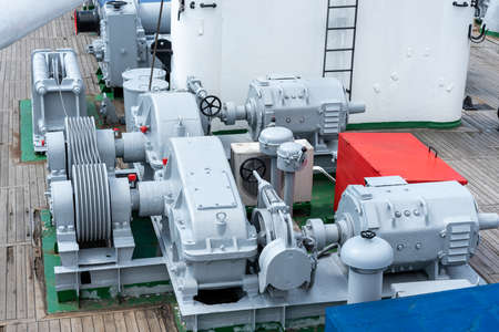 mooring winches on the deck of a container ship, equipment on the deck of a ship. The concept of cargo transportation.の写真素材