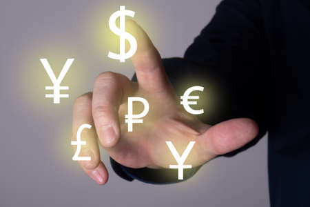 The finger touches the dollar icon. The concept of business and finance.の写真素材
