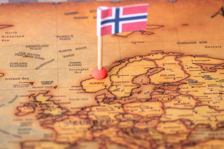 the flag of Norway on the world map. The concept of travel and recreation in Norway.の写真素材