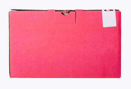 Pink cardboard box on a white background. The box is opened, the package is openedの写真素材