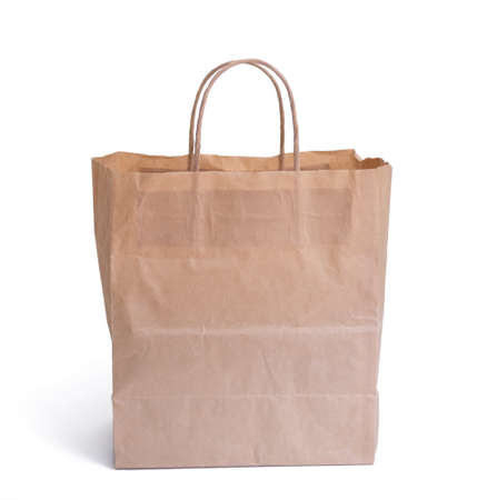 Paper shopping bag isolated on white background. The concept of eco bags.の写真素材