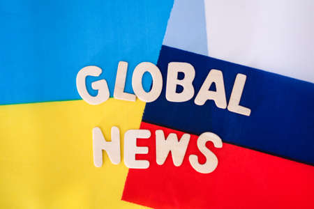 Flag of Ukraine and Russia, global news. The concept of global news of Ukraine and Russia.の写真素材