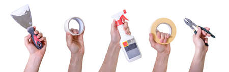 Hands with different tools on a white background. Labor Day for the first of May. The concept of working with hands.の写真素材