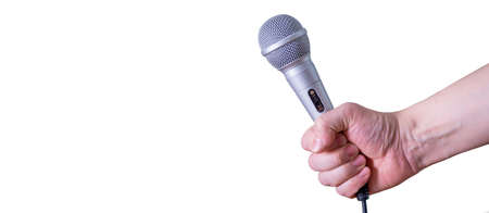 Female hand with microphone, on white background. World Press Freedom Day.の写真素材