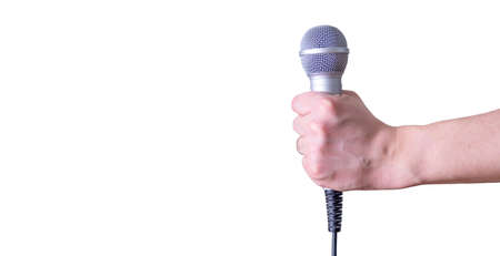 Female hand with microphone, on white background. World Press Freedom Day.の写真素材