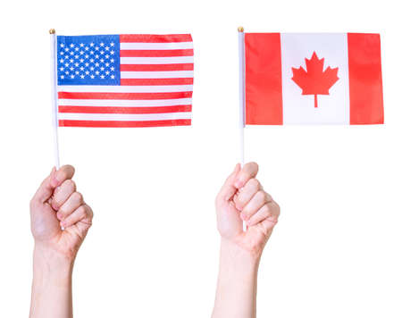 The flag of America and Canada on a white isolated background. The concept of great countries.の写真素材