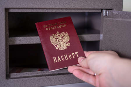Russian passport in the safe with rubles. Russian passport under sanctions.の写真素材
